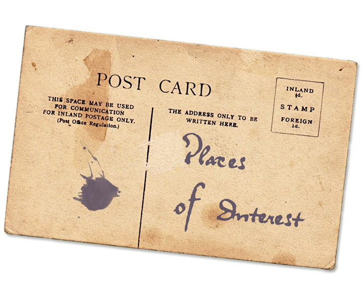 The back side of an old and worn looking postcard bearing the hand-written title Places of Interest